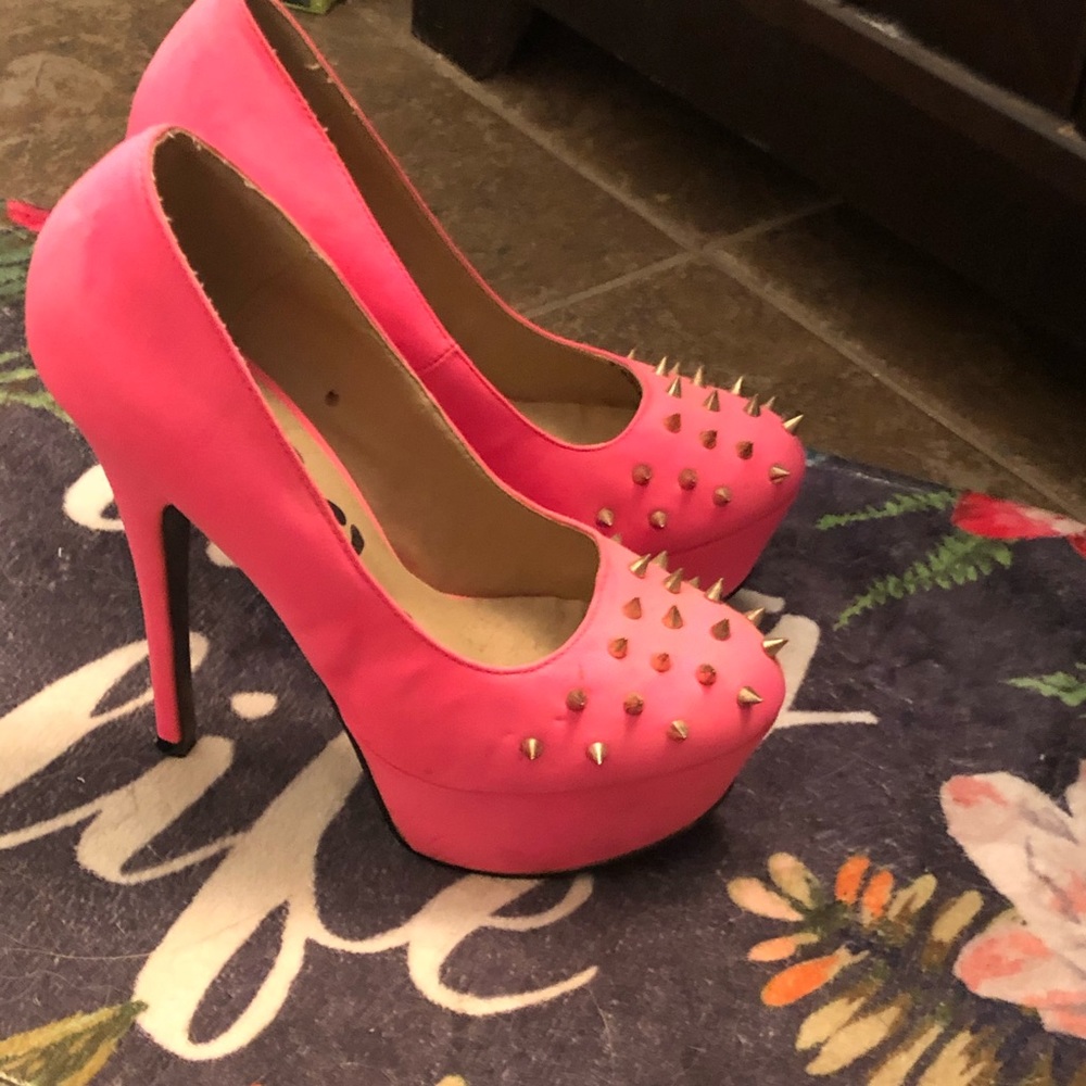 Pink spike heels